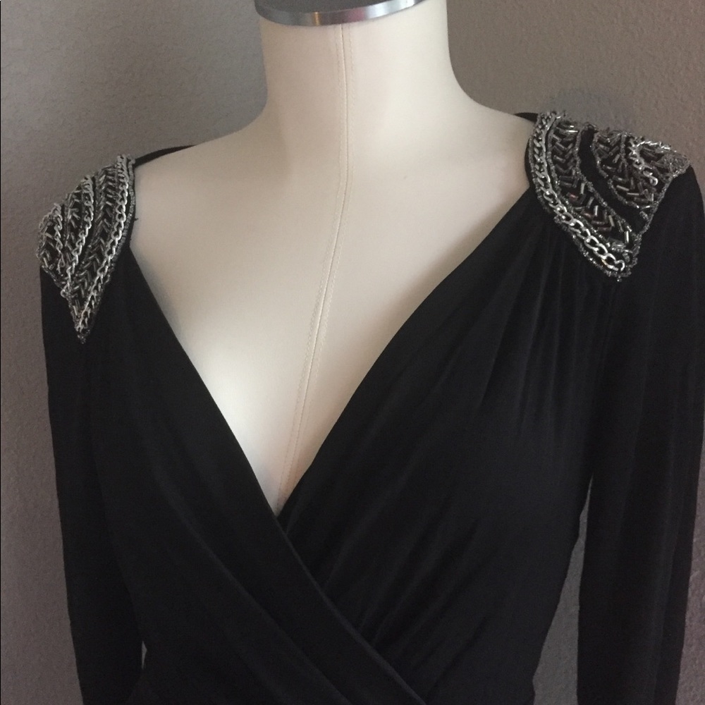 Dress with beaded shoulders
